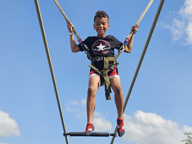 [Kid in Bounce Harness]