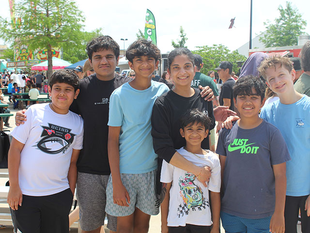 [Family Smiling at Camera]